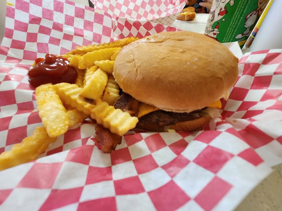 Casual burger restaurant interior with counter service.
